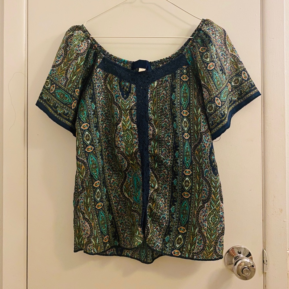Francesca's patterned blouse